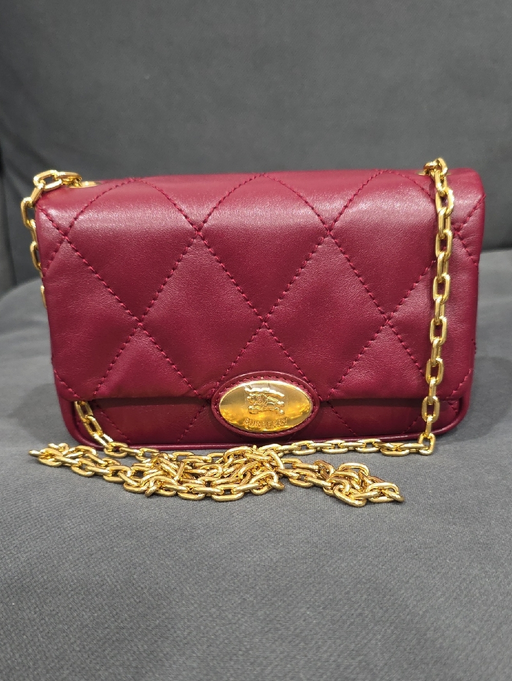 Burberry Strand Clutch Crossbody with Gold color Chain